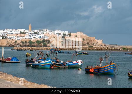 Skyline of Morocco's capital city Rabat, fisher boats anchor at river Bou Regreg Stock Photo