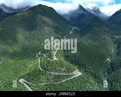 221001 -- LHASA, Oct. 1, 2022 -- Aerial photo taken on Sept. 30, 2022 shows the highway linking Pad Township in the city of Nyingchi and Medog County, southwest China s Tibet Autonomous Region. The 67.22-km road connects Pad Township in the city of Nyingchi and Medog County. It is the second passageway to Medog, following the first one connecting the county and Zhamog Township, Bomi County. After the new highway opens to traffic, the length of the road connecting the city proper of Nyingchi and Medog County will be shortened to 180 km from 346 km, cutting travel time to four hours. Photo by /X Stock Photo