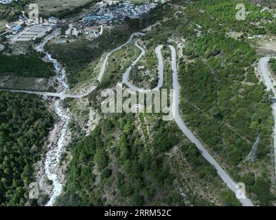 221001 -- LHASA, Oct. 1, 2022 -- Aerial photo taken on Sept. 30, 2022 shows the highway linking Pad Township in the city of Nyingchi and Medog County, southwest China s Tibet Autonomous Region. The 67.22-km road connects Pad Township in the city of Nyingchi and Medog County. It is the second passageway to Medog, following the first one connecting the county and Zhamog Township, Bomi County. After the new highway opens to traffic, the length of the road connecting the city proper of Nyingchi and Medog County will be shortened to 180 km from 346 km, cutting travel time to four hours. Photo by /X Stock Photo