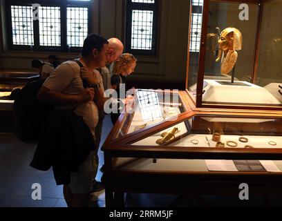 221003 -- CAIRO, Oct. 3, 2022 -- People visit the exhibition of the Treasure of Tanis at Egyptian Museum in Cairo, Egypt, on Oct. 3, 2022. The museum recently opened the exhibition in celebration of the 200th anniversary of the creation of the field of Egyptology and the decoding of ancient hieroglyphs.  EGYPT-CAIRO-EGYPTIAN MUSEUM-EXHIBITION-TREASURE OF TANIS AhmedxGomaa PUBLICATIONxNOTxINxCHN Stock Photo