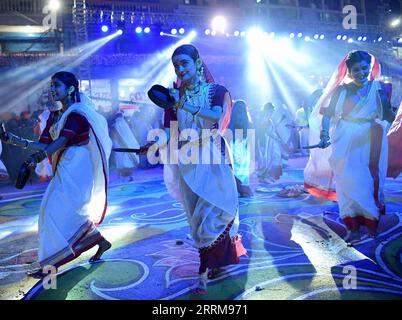 221007 -- AGARTALA INDIA, Oct. 7, 2022 -- Dancers perform during Durga Puja carnival in Agartala, the capital city of Tripura, northeastern India, on Oct. 7, 2022. Str/Xinhua INDIA-AGARTALA-DURGA PUJA CARNIVAL JavedxDar PUBLICATIONxNOTxINxCHN Stock Photo