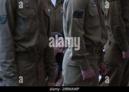 221012 -- GEDERA ISRAEL, Oct. 12, 2022 -- Soldiers and relatives attend the funeral of an Israeli soldier at the military cemetery in Gedera, central Israel, on Oct. 12, 2022. The Israeli soldier was killed in a drive-by shooting attack in the occupied West Bank on Tuesday, amid escalating violence between Israel and the Palestinians.  via Xinhua ISRAEL-GEDERA-SOLDIER-FUNERAL IlanxAssayag/JINI PUBLICATIONxNOTxINxCHN Stock Photo