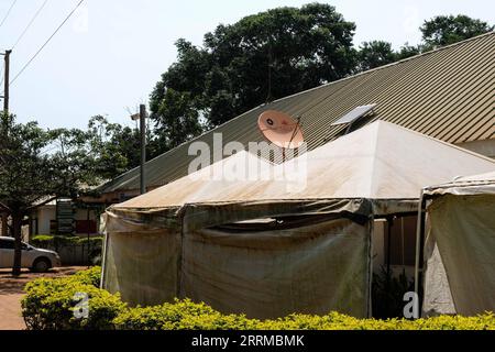 221015 -- WAKISO, Oct. 15, 2022 -- A satellite dish provided by Chinese satellite television StarTimes is seen at Wagagai Health Center in Katabi, Uganda, Oct. 13, 2022. The Access to Satellite TV for 10,000 African Villages project in Uganda is implemented by Chinese satellite television, StarTimes. This project is one of the fruits of the resolutions of the Forum on China-Africa Cooperation Johannesburg Summit held in 2015 in South Africa. TO GO WITH Feature: China-aided satellite TV connects remote Ugandan villages to outside world Photo by Hajarah Nalwadda/Xinhua UGANDA-SATELLITE TV-STARTI Stock Photo