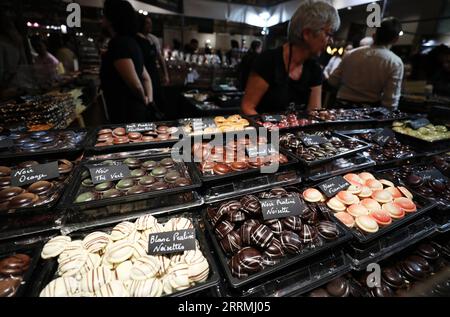 221101 -- PARIS, Nov. 1, 2022 -- Chocolates are displayed at the 27th Salon du Chocolat at the Versailles Expo in Paris, France, Oct. 31, 2022. The 27th Salon du Chocolat chocolate fair was held from Oct. 28 to Nov. 1.  FRANCE-PARIS-CHOCOLATE FAIR GaoxJing PUBLICATIONxNOTxINxCHN Stock Photo