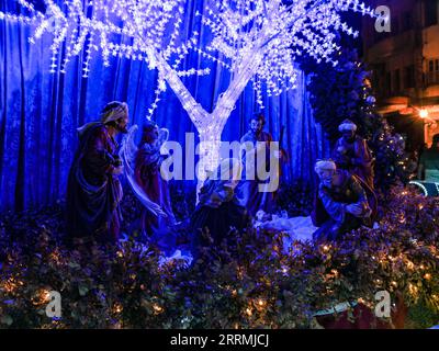 Scene of the birth of Jesus, detail of the illuminated nativity scene from inside the church of Nossa Senhora dos Remédios, in the Historic Center of Stock Photo