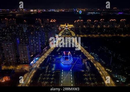 221120 -- HARBIN, Nov. 20, 2022 -- This aerial photo shows a concert hall being lit up to celebrate World Children s Day in Harbin, northeast China s Heilongjiang Province, Nov. 20, 2022.  CHINA-WORLD CHILDREN S DAY-BUILDINGS-LIGHTING CN ZhangxTao PUBLICATIONxNOTxINxCHN Stock Photo