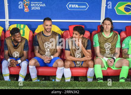 Moscow, Russia - June 27, 2018. Brazil national football team players Fred, Renato Augusto, Marquinhos and Cassio at the substitute bench during FIFA Stock Photo