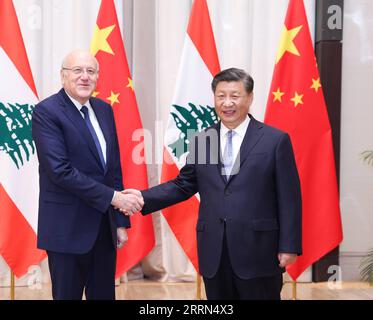 221209 -- RIYADH, Dec. 9, 2022 -- Chinese President Xi Jinping meets with Lebanese Prime Minister Najib Mikati in Riyadh, Saudi Arabia, Dec. 9, 2022.  SAUDI ARABIA-RIYADH-XI JINPING-LEBANON-PM-MEETING YaoxDawei PUBLICATIONxNOTxINxCHN Stock Photo