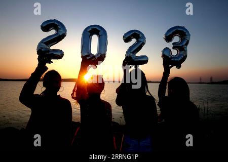 230110 -- BEIJING, Jan. 10, 2023 -- People celebrate ahead of New Year in Bhopal, the capital of India s Madhya Pradesh state, Dec. 31, 2022. Str/Xinhua XINHUA-PICTURES OF THE YEAR 2022-WORLD NEWS JavedxDar PUBLICATIONxNOTxINxCHN Stock Photo