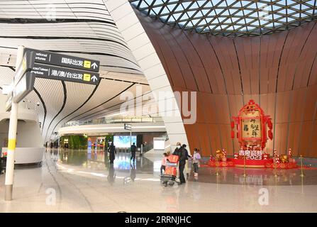 230117 -- BEIJING, Jan. 17, 2023 -- This photo taken on Jan. 17, 2023 shows an interior view of the Beijing Daxing International Airport in Beijing, capital of China. With the take-off of the CZ309 flight to Hong Kong, the Beijing Daxing International Airport on Tuesday resumed the operation of international passenger flights after China continuously optimized COVID-19 epidemic prevention and control policies. As Beijing s newest airport, the Beijing Daxing International Airport became operational on September 25, 2019. From March 14, 2020, the airport s international flights were transferred Stock Photo