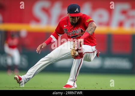 Atlanta Braves shortstop Orlando Arcia throws to first for a double play in  the second inning of a baseball game against the Colorado Rockies, Sunday,  June 18, 2023, in Atlanta. (AP Photo/Butch