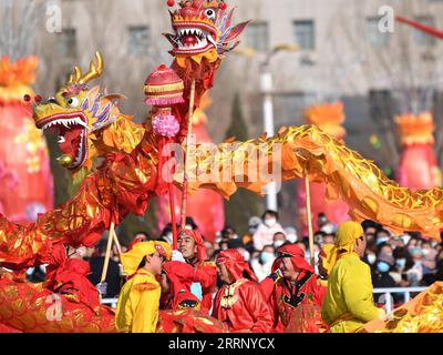230205 -- BAIYIN, Feb. 5, 2023 -- People perform dragon dance in Baiyin, northwest China s Gansu Province, Feb. 5, 2023. People celebrate the Lantern Festival, the 15th day of the first month of the Chinese lunar calendar, with various traditional customs across the country.  CHINA-LANTERN FESTIVAL-TRADITIONAL CUSTOM CN ChenxBin PUBLICATIONxNOTxINxCHN Stock Photo