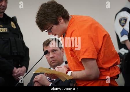 230215 -- BUFFALO U.S., Feb. 15, 2023 -- Payton Gendron Front reads an apology to the court in Buffalo, New York State, the United States, on Feb. 15, 2023. The 19-year-old man Payton Gendron, who committed the mass shooting last May in Buffalo of the U.S. state of New York, was sentenced to life in prison without parole on Wednesday as expected while white supremacy got bashed at court. Derek Gee/Buffalo News/Pool via Xinhua U.S.-BUFFALO-MASS SHOOTER-SENTENCE LiuxYanan PUBLICATIONxNOTxINxCHN Stock Photo