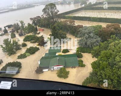 Neuseeland, schwere Überschwemmungen 230217 -- WELLINGTON, Feb. 17, 2023 -- This aerial photo provided by the New Zealand Defense Force  on Feb. 16, 2023 shows the flood scene in Hawke s Bay, New Zealand. Unprecedented floods and landslides have left eight people dead and more than 3,500 others missing as Cyclone Gabrielle lashes New Zealand s North Island this week. /Handout via Xinhua NEW ZEALAND-CYCLONE GABRIELLE-AFTERMATH NZDF PUBLICATIONxNOTxINxCHN Stock Photo