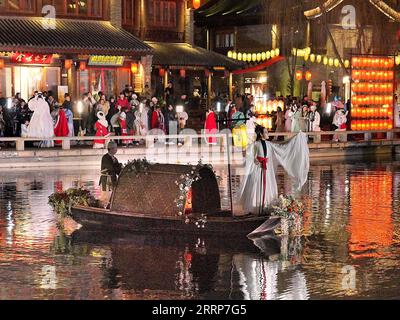 230227 -- LUOYANG, Feb. 27, 2023 -- Actors perform at Luoyi ancient city in Luoyang, central China s Henan Province, Feb. 22, 2023. Official data showed that the city saw 10.31 million trips in January of 2023, generating 6.28 billion yuan about 902.44 million U.S. dollars in revenue, up 746.63 percent and 690.06 percent year on year respectively.  CHINA-HENAN-LUOYANG-CULTURAL AND TOURISM INDUSTRY CN LixAn PUBLICATIONxNOTxINxCHN Stock Photo