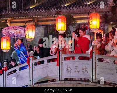 230227 -- LUOYANG, Feb. 27, 2023 -- Tourists visit Luoyi ancient city in Luoyang, central China s Henan Province, Feb. 22, 2023. Official data showed that the city saw 10.31 million trips in January of 2023, generating 6.28 billion yuan about 902.44 million U.S. dollars in revenue, up 746.63 percent and 690.06 percent year on year respectively.  CHINA-HENAN-LUOYANG-CULTURAL AND TOURISM INDUSTRY CN LixAn PUBLICATIONxNOTxINxCHN Stock Photo