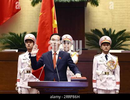 230302 -- HANOI, March 2, 2023 -- Vietnam s newly elected President Vo Van Thuong takes the oath of allegiance to the Constitution at the Parliament House in Hanoi, Vietnam, on March 2, 2023. Vo Van Thuong, a member of the Politburo of the Communist Party of Vietnam CPV, was elected as Vietnam s new president on Thursday, Vietnam News Agency reported. The country s top legislature convened a special meeting and elected Thuong as the new president with an approval rate of 98.38 percent, according to Vietnam News Agency. /Handout via Xinhua VIETNAM-HANOI-NEWLY ELECTED PRESIDENT-VO VAN THUONG VNA Stock Photo