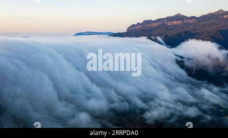 230314 -- CHONGQING, March 14, 2023 -- This aerial photo taken on March 13, 2023 shows clouds over Jinfo Mountain in southwest China s Chongqing. Photo by /Xinhua CHINA-CHONGQING-CLOUDS CN QuxMingbin PUBLICATIONxNOTxINxCHN Stock Photo