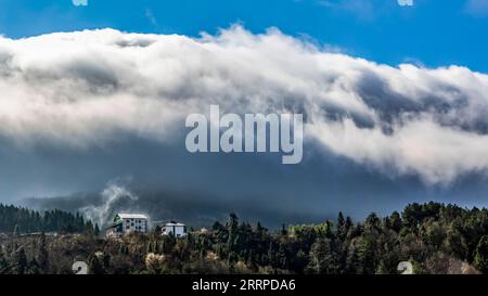 230314 -- CHONGQING, March 14, 2023 -- This photo taken on March 13, 2023 shows clouds over Jinfo Mountain in southwest China s Chongqing. Photo by /Xinhua CHINA-CHONGQING-CLOUDS CN QuxMingbin PUBLICATIONxNOTxINxCHN Stock Photo