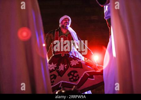 230413 -- CAIRO, April 13, 2023 -- A dancer performs Tanoura, a traditional Egyptian folk dance, during the holy month of Ramadan at the Sultan Al-Ghuri complex in Cairo, Egypt, on April 12, 2023. Tanoura is an Arabic word, which means skirt in English. Tanoura dance is a traditional folk dance in Egypt, where the dancer in colorful skirts spins to the tunes of songs.  EGYPT-CAIRO-RAMADAN-TANOURA DANCE AhmedxGomaa PUBLICATIONxNOTxINxCHN Stock Photo