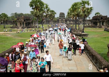 230417 -- SIEM REAP, April 17, 2023 -- Tourists visit the Angkor Archeological Park in Siem Reap province, Cambodia, April 16, 2023. Cambodia s three-day Sankranta festival, or the traditional New Year celebration, ended on Sunday with 13.1 million people traveling to various tourist attractions across the kingdom, Tourism Minister Thong Khon said on Monday. TO GO WITH Cambodia s Sankranta festival ends with over 13 mln tourists traveling across country Photo by /Xinhua CAMBODIA-SANKRANTA FESTIVAL-TOURISM SaoxKhuth PUBLICATIONxNOTxINxCHN Stock Photo