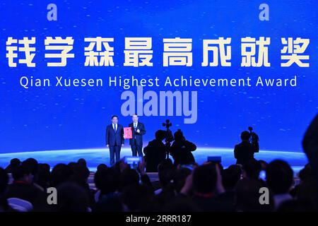 230424 -- HEFEI, April 24, 2023 -- Zhou Jianping, an academician of the Chinese Academy of Engineering and the chief designer of China s manned space program, is awarded the Qian Xuesen Highest Achievement Award in Hefei, east China s Anhui Province, April 24, 2023. China celebrated its Space Day this year on Monday with a series of activities and events. A launch ceremony of the Space Day was held Monday in Hefei, capital city of east China s Anhui Province, with this year s theme of Investigate things to extend knowledge, exploring the firmament. About 1,200 guests from over 40 countries are Stock Photo