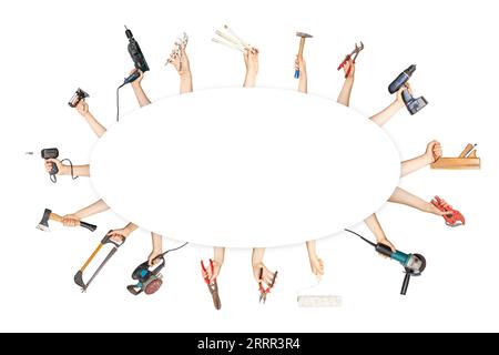 Hands holding multiple tools around  an oval empty space for text, hardware advertising sign backdrop, round Stock Photo