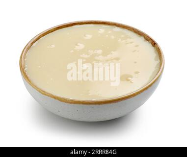 bowl of condensed milk isolated on white background Stock Photo