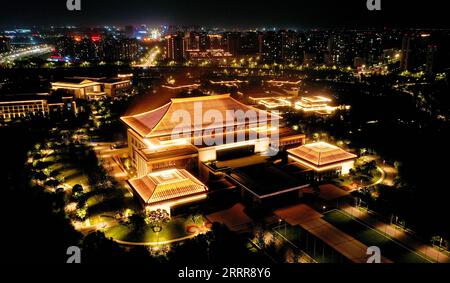 230516 -- XI AN, May 16, 2023 -- This aerial photo taken on May 1, 2023 shows a night view of the Xi an international convention center at the Chanba ecological zone in Xi an, northwest China s Shaanxi Province. As the provincial capital of northwest China s Shaanxi Province, Xi an, a city founded more than 3,100 years ago, served as the capital for 13 dynasties in Chinese history, including Tang 618-907, when the city was known as Chang an. This is also the place where Zhang Qian began his journey to the Western regions via Central Asia during the Western Han Dynasty 202 BC-AD 25 with his env Stock Photo