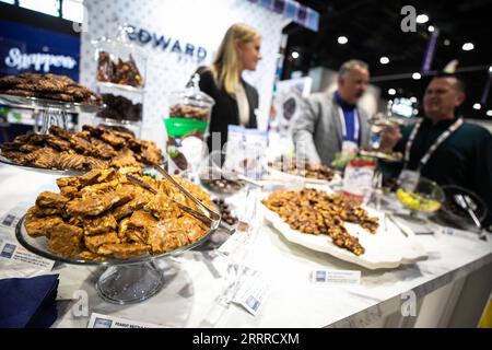 230523 -- CHICAGO, May 23, 2023 -- Snacks are on display at a booth at the Sweets and Snacks Expo in Chicago, the United States, on May 23, 2023. The 2023 Sweets and Snacks Expo is held at McCormick Place in Chicago from May 22 to May 25. Photo by /Xinhua U.S.-CHICAGO-SWEETS AND SNACKS EXPO VincentxD.xJohnson PUBLICATIONxNOTxINxCHN Stock Photo