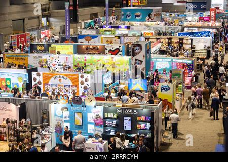 230523 -- CHICAGO, May 23, 2023 -- People visit the Sweets and Snacks Expo in Chicago, the United States, on May 23, 2023. The 2023 Sweets and Snacks Expo is held at McCormick Place in Chicago from May 22 to May 25. Photo by /Xinhua U.S.-CHICAGO-SWEETS AND SNACKS EXPO VincentxD.xJohnson PUBLICATIONxNOTxINxCHN Stock Photo