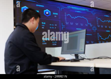 230525 -- GUIYANG, May 25, 2023 -- A staff member works at the State Key Laboratory of Public Big Data at Guizhou University in Guiyang, southwest China s Guizhou Province, May 23, 2023. As the first of its kind in the field of big data in the country, Guizhou University s State Key Laboratory of Public Big Data has three stable research directions, including multi-source data fusion and integration technology, public big data security and privacy protection, block data and regional governance.  CHINA-GUIZHOU-PUBLIC BIG DATA-STATE KEY LABORATORY CN LiuxXu PUBLICATIONxNOTxINxCHN Stock Photo