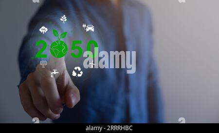 Hand holding virtual Global with CO2 reducing icon for concept of ...
