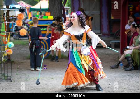 230529 -- WAXAHACHIE U.S., May 29, 2023 -- A girl performs acrobatics at the Scarborough Renaissance Festival in Waxahachie, on the outskirts of Dallas, Texas, the United States, on May 29, 2023. Photo by /Xinhua U.S.-TEXAS-WAXAHACHIE-SCARBOROUGH RENAISSANCE FESTIVAL DanxTian PUBLICATIONxNOTxINxCHN Stock Photo