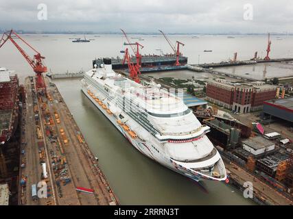 230606 -- SHANGHAI, June 6, 2023 -- This aerial photo taken on June 6, 2023 shows China s first domestically-built large cruise ship Adora Magic City in east China s Shanghai. China s first domestically-built large cruise ship completed its undocking in Shanghai on Tuesday, marking its complete transition into the dock mooring debugging stage. The cruise ship Adora Magic City is expected to be delivered by the end of 2023.  CHINA-SHANGHAI-HOME-GROWN CRUISE SHIP-UNDOCKING CN DingxTing PUBLICATIONxNOTxINxCHN Stock Photo