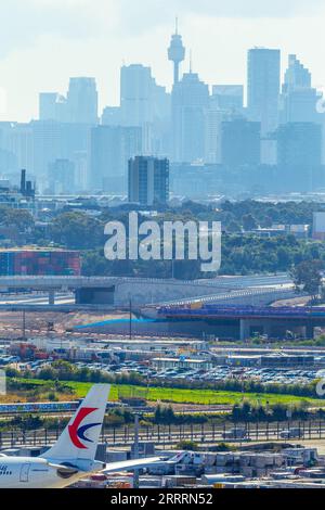 Construction of the Sydney Gateway project in Sydney, Australia, seen from Sydney Airport and Airport Drive with the Sydney city skyline in the backgr Stock Photo