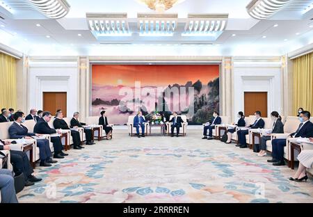 230612 -- BEIJING, June 12, 2023 -- Li Shulei, a member of the Political Bureau of the Communist Party of China CPC Central Committee and head of the Publicity Department of the CPC Central Committee, meets with foreign representatives attending the China-Central Asia political parties dialogue, including Deputy Chairman of the Mazhilis of the Parliament of the Republic of Kazakhstan Rau Albert and Vice-Speaker of the Jogorku Kenesh of the Kyrgyz Republic Isaeva Dzhamilia, in Beijing, capital of China, June 12, 2023.  CHINA-BEIJING-LI SHULEI-CHINA-CENTRAL ASIA POLITICAL PARTIES DIALOGUE-FOREIG Stock Photo