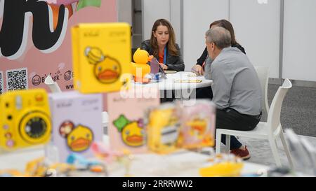 230615 -- LAS VEGAS, June 15, 2023 -- People visit the exhibition area of Chinese brand B. Duck during Licensing Expo 2023 in Las Vegas, the United States, on June 13, 2023. Companies of the Chinese licensing industry are participating in a world s leading licensing expo this week in Las Vegas, U.S. state of Nevada, seeking opportunities to expand their influence and businesses in the global licensing market. Photo by /Xinhua TO GO WITH Roundup: Chinese companies embrace new opportunities at world s leading licensing expo U.S.-LAS VEGAS-LICENSING EXPO 2023-CHINESE COMPANIES ZengxHui PUBLICATIO Stock Photo