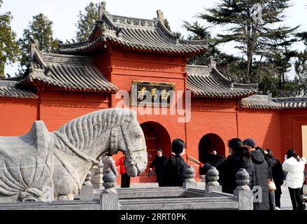 230620 -- ZHENGZHOU, June 20, 2023 -- Tourists visit the Baima Temple, or White Horse Temple, in Luoyang, central China s Henan Province, March 1, 2023. Luoyang, an ancient capital city in central China s Henan Province, has been a dazzling name amid the splendid Chinese civilization -- with over 4,000 years of history, the city served as the capital for 13 Chinese dynasties. Present-day Luoyang is home to five capital city ruins, six UNESCO World Heritage sites, 197 cultural relic units under national and provincial protection, 9,000 pieces of immovable cultural relics, and 102 museums. While Stock Photo