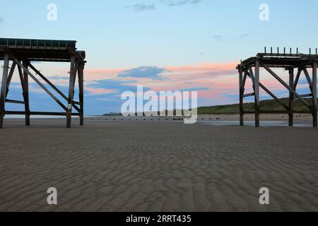 Derelict wooden pier on a beach at Hartlepool,County Durham, England, UK. Stock Photo