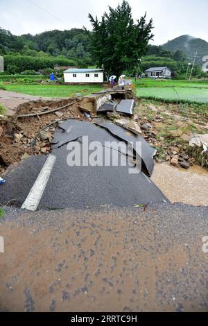 230715 -- SEOUL, July 15, 2023 -- A collapsed road is seen in Yecheon county of North Gyeongsang Province, South Korea, July 15, 2023. Heavy rains in South Korea had left at least seven people dead, three missing and seven others injured, Yonhap news agency said Saturday citing relevant authorities.  via Xinhua SOUTH KOREA-HEAVY RAINS-DEATH TOLL NEWSIS PUBLICATIONxNOTxINxCHN Stock Photo