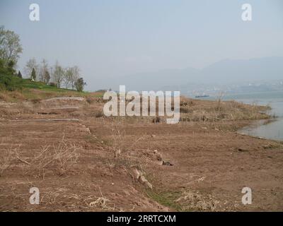 230717 -- ZHONGXIAN, July 17, 2023 -- This file photo taken in March 2009 shows an area of the Three Gorges Reservoir in Zhongxian County, southwest China s Chongqing. The Three Gorges Reservoir region, home to the world s largest hydropower project, covers about 10,000 square km along the Yangtze River, China s longest waterway. The seasonal gaps in the reservoir s water levels have resulted in a water-level fluctuation zone covering 349 square kilometers along the Yangtze River. The zone suffers environmental problems, including soil erosion and pollution. Researchers of the Institute of Mou Stock Photo