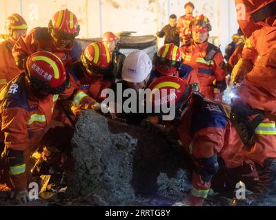 230724 -- QIQIHAR, July 24, 2023 -- Rescuers work at the site of a ...