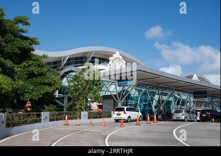 25.07.2023, Denpasar, Bali, Indonesia, Asia - Exterior view of the departure level and terminal building at I Gusti Ngurah Rai International Airport. Stock Photo