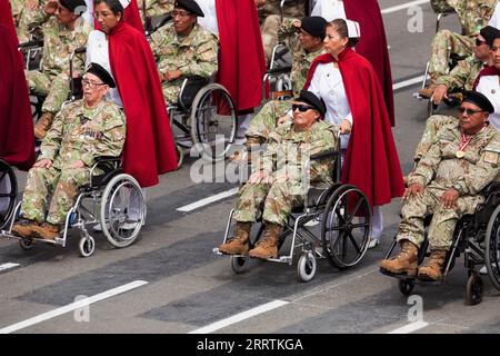 230730 -- LIMA, July 30, 2023 -- Veterans attend a parade to mark the 202nd anniversary of the independence of Peru in Lima, Peru, July 29, 2023.  PERU-LIMA-INDEPENDENCE-COMMEMORATION-PARADE MarianaxBazo PUBLICATIONxNOTxINxCHN Stock Photo