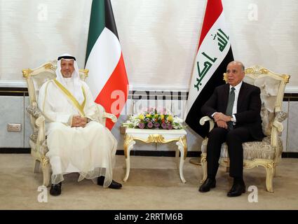 Irak, Außenminister Fuad Hussein trifft Amtskollegen aus Kuwait Salem Abdullah Al-Jaber Al-Sabah  230731 -- BAGHDAD, July 31, 2023 -- Iraqi Foreign Minister Fuad Hussein R meets with his Kuwaiti counterpart Sheikh Salem Abdullah Al-Jaber Al-Sabah in Baghdad, Iraq, July 30, 2023. Kuwaiti Foreign Minister Sheikh Salem Abdullah Al-Jaber Al-Sabah paid an official visit to Iraq s capital Baghdad on Sunday and held talks with Iraqi leaders in an attempt to end border demarcation and joint oil field disputes.  IRAQ-BAGHDAD-KUWAITI FM-VISIT KhalilxDawood PUBLICATIONxNOTxINxCHN Stock Photo
