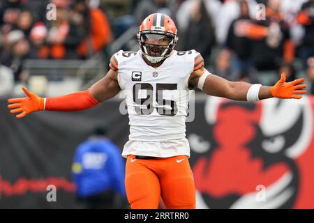 FILE - In this Aug. 8, 2019, file photo, Cleveland Browns defensive end  Chris Smith (50) sits on the sideline during the first half of an NFL  preseason football game against the