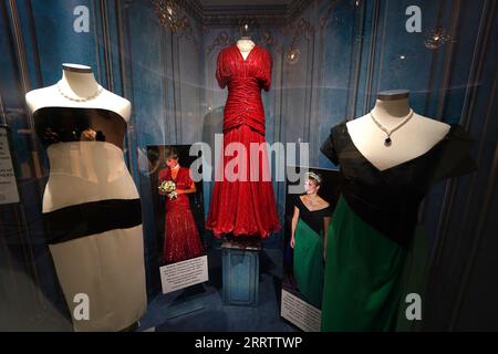 File photo dated 03/5/23 of dresses owned by the late Diana, Princess of Wales, on display at the exhibition Princess Diana – Fashion from the Wardrobe of The People's Princess, at the Museum of Style Icons in Newbridge, Co. Kildare, before they go under the hammer at Julien's Auctions in Los Angeles this summer. Gowns worn by Diana, Princess of Wales have collectively sold for more than £1 million at an auction in the US. A red Bruce Oldfield silk gown worn by Diana to the premiere of Hot Shots on at the Odeon, Leicester Square, in November 1991, sold for 571,500 US dollars (£458,484) at an e Stock Photo