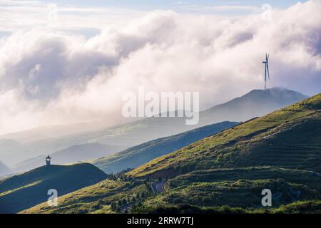 230815 -- GUIYANG, Aug. 15, 2023 -- This aerial photo taken on Aug. 19, 2020 shows a wind turbine in Hezhang County, southwest China s Guizhou Province. Guizhou has seized the opportunity and made big stride in the development of new energy industry, such as wind power and photovoltaic power, in recent years. While vigorously developing green energy, Guizhou has also made full use of the land under photovoltaic panels to develop farming and livestock breeding. By the end of June 2023, the total installed capacity of new energy in Guizhou had reached 21.81 million kilowatts.  CHINA-GUIZHOU-GREE Stock Photo