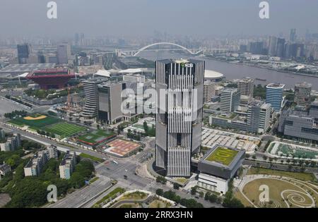 230818 -- BEIJING, Aug. 18, 2023 -- This aerial photo taken on June 17, 2022 shows the headquarters building of the New Development Bank in east China s Shanghai.  Xinhua Headlines: Xi to visit South Africa for BRICS summit, outreach to African countries FangxZhe PUBLICATIONxNOTxINxCHN Stock Photo